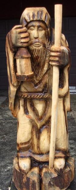 Hooded Monk chainsaw carving